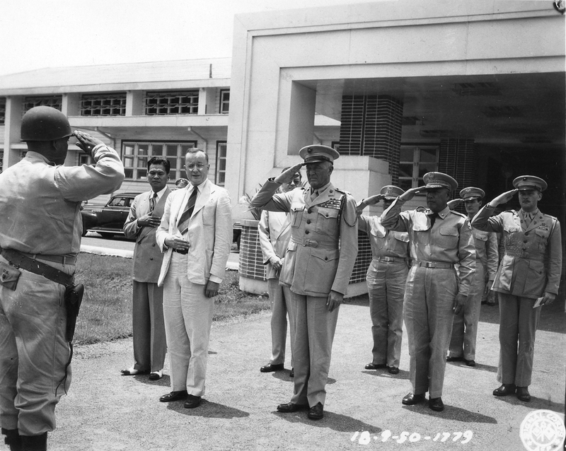 General Graves B. Erskine saluting Harry S. Truman