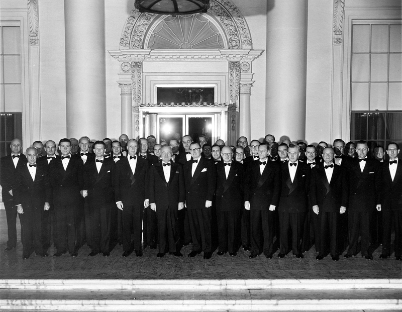 Group photograph of President Truman with undersecretaries and aides of