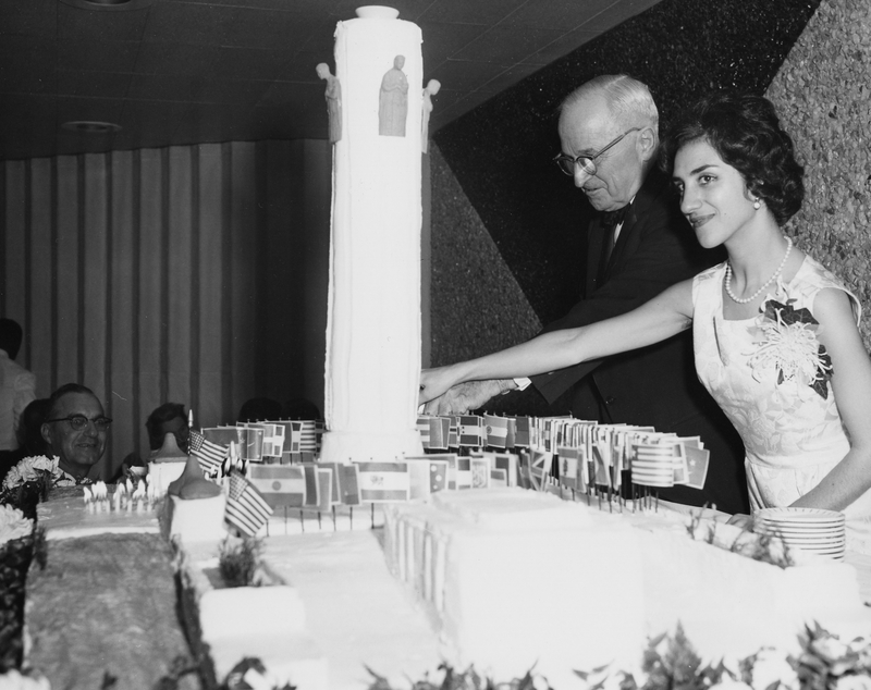 Truman and young lady cut a cake | Harry S. Truman