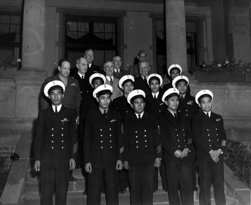 President Truman with Filipino stewards and others at the Little White