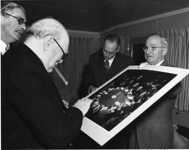 Truman showing Churchill a photo of the Potsdam Conference ...