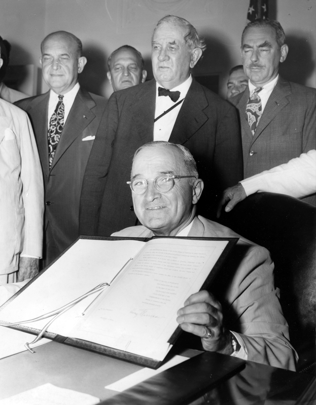 Truman signing North Atlantic Treaty document | Harry S. Truman