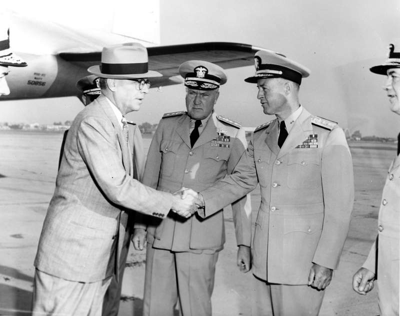 Navy under secretary francis p whitehair greets naval officers at the