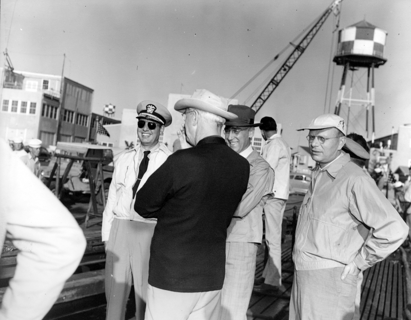 Aboard the submarine Corporal are Admiral Robert Dennison, William