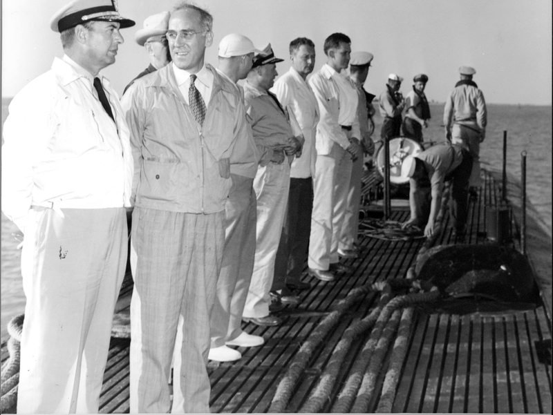Shown aboard the submarine Corporal are Admiral Robert Dennison