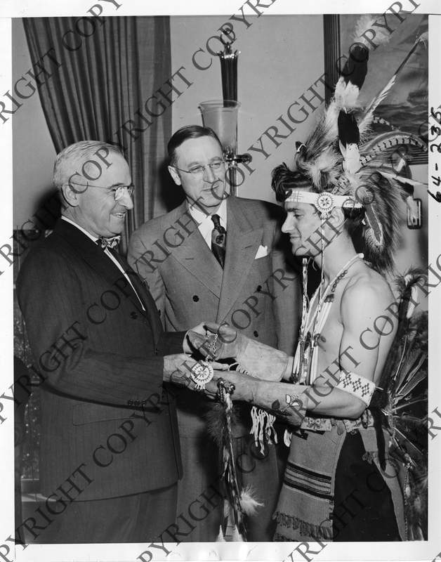 President Harry S. Truman Receiving "Crazy Dog" Necklace Harry S. Truman