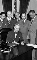 President Truman signs Philippine Immigration Bill, July 2, 1946.