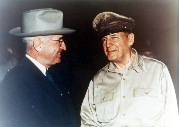 Truman and McArthur meeting face to face for the first time at Wake Island. 