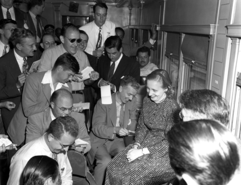Margaret Truman holds a press conference aboard President Truman's