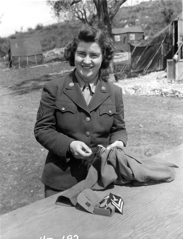 Women's Army Corps (WAC) Technician Laura O. Howieson Sews on Her New