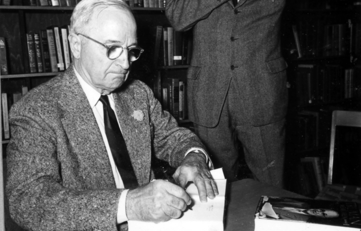 Former President Truman signs "Truman Memoirs." | Harry S. Truman