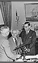 President Truman meeting on May 8, 1951 with Prime Minister David Ben Gurion of Israel and Abba Eban. They presented the menorah as a token of esteem for President Truman's timely recognition of the State of Israel on May 14, 1948.